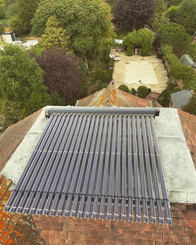 Evacuated tube solar thermal array on a tiled roof